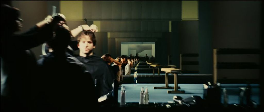 A figure repeated through a receding sequence of mirrors